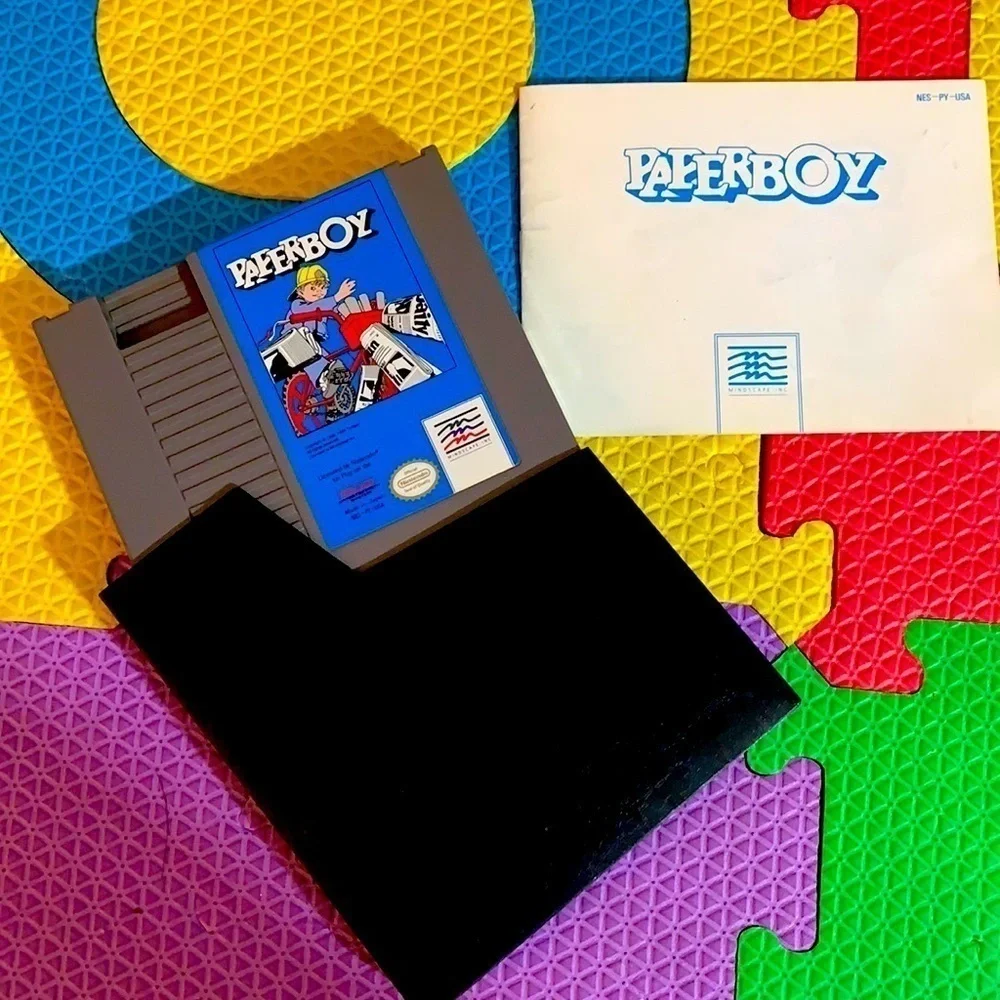 Vintage Paperboy cassette game Nintendo Entertainment System, 1988 & book